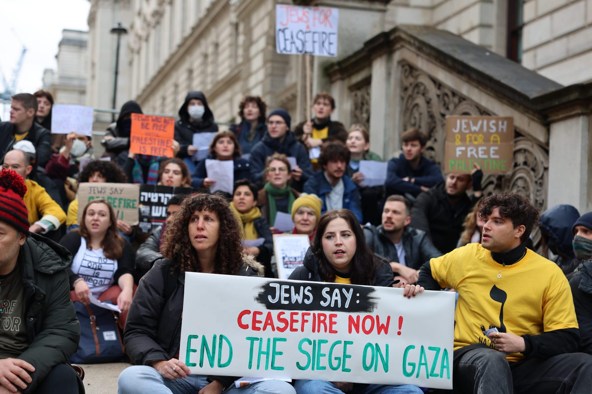Activists join a sit-in outside the Foreign, Commonwealth and Development Office organised by Na'amod to demand a ceasefire in Gaza, 31 October, 2023. Credit: Jacob Lazarus